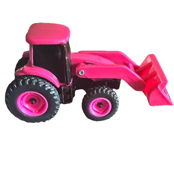 1/64 ERTL Collect N Play Case IH Pink Tractor with Loader, ZFN46705 - Picture 1 of 9
